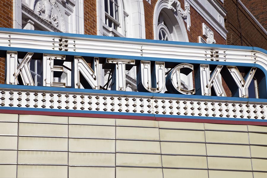 Contact Us - Red, White and Blue Lightbulb Sign Over Theater Reading Kentucky